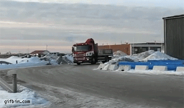 1387136878_truck_drifts_into_garage.gif