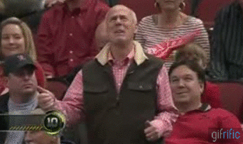 Old-man-dancing-at-game.gif
