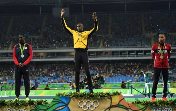 Mens-100m-Victory-Ceremony.jpg