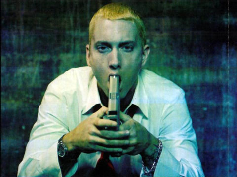 eminem-slim-shady-holding-using-gun-pistol.jpg